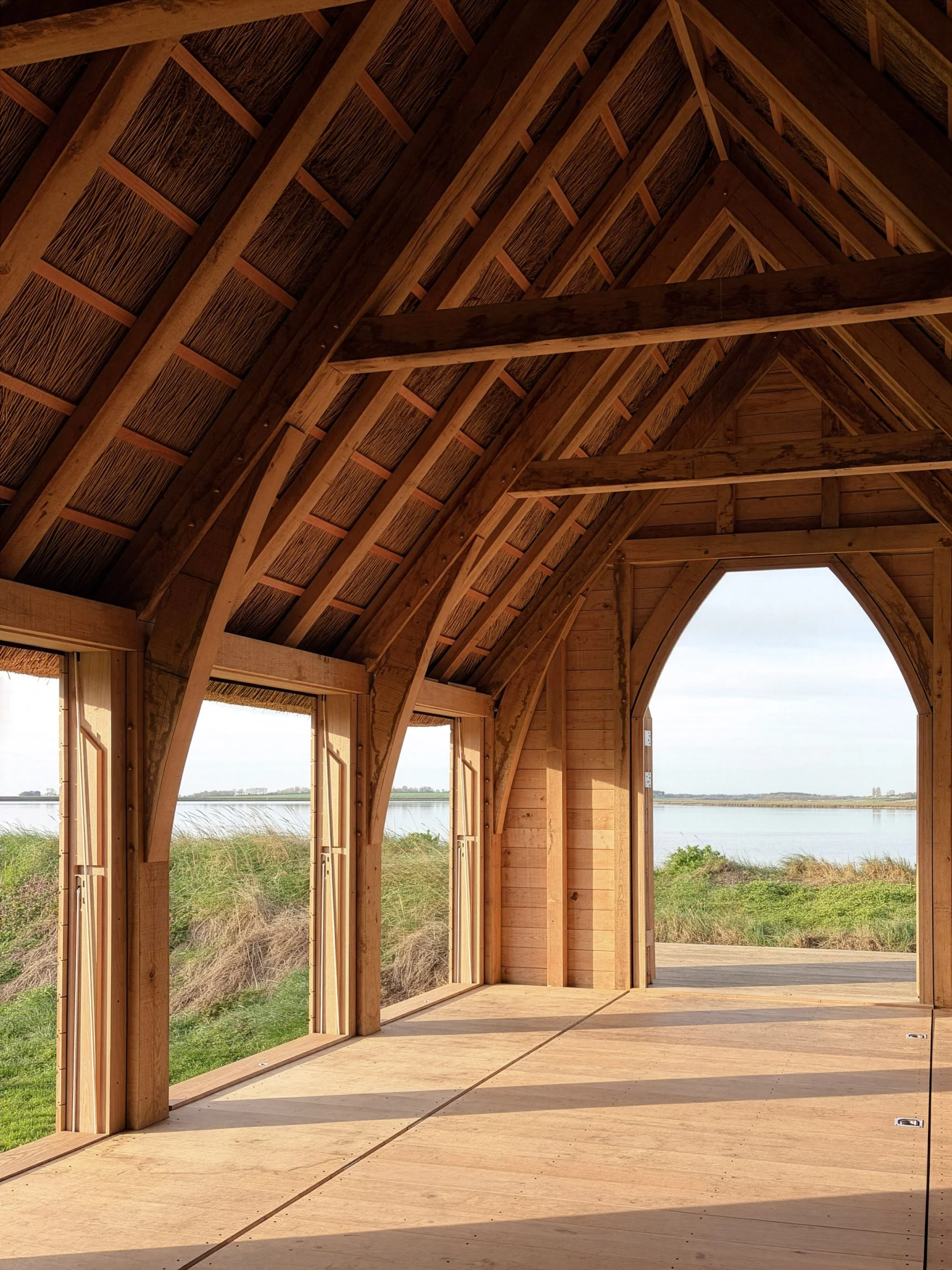 Timber shutters creating a gathering space in Alde Boathouse