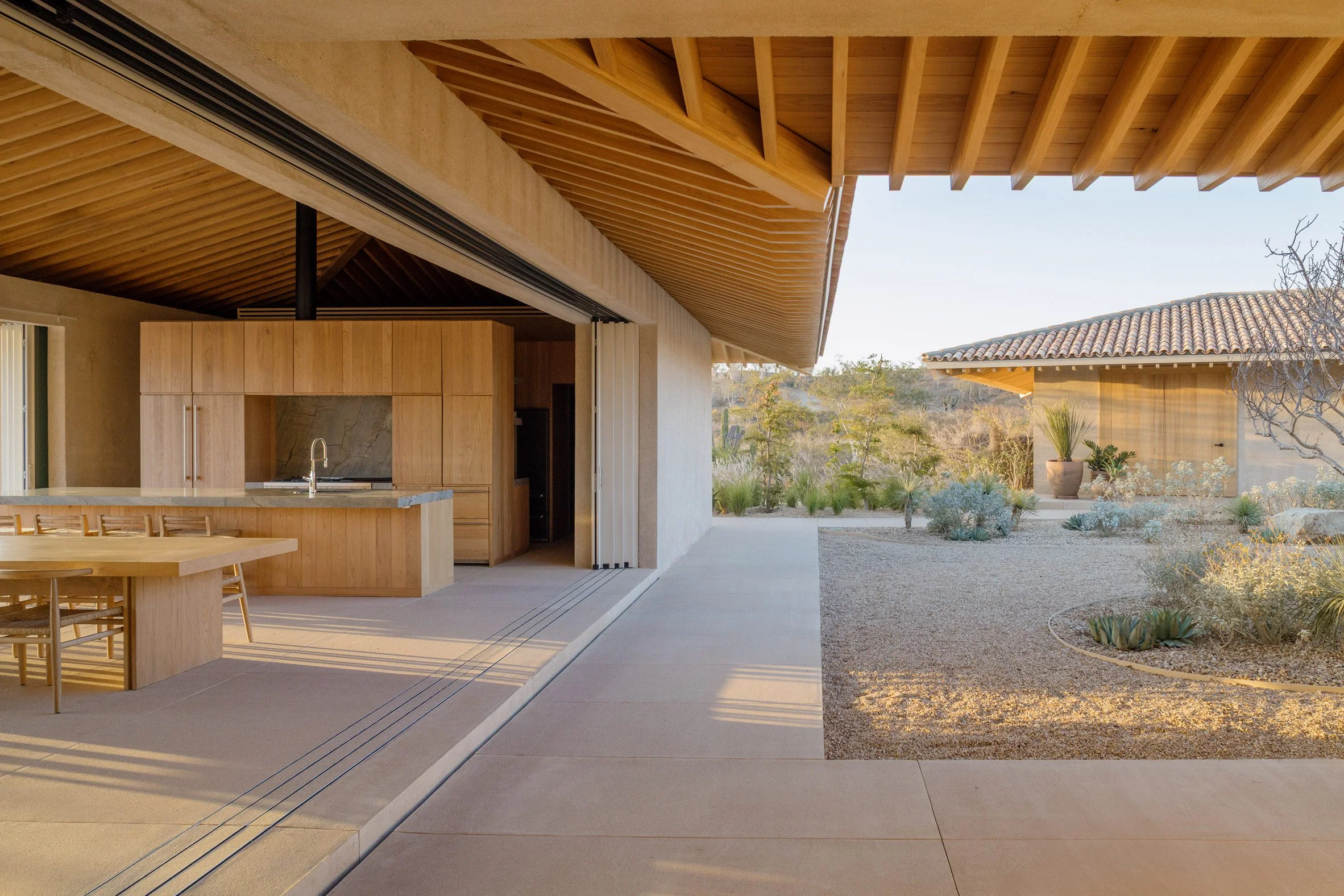 Laminated oak beams expressed inside a lofty living space